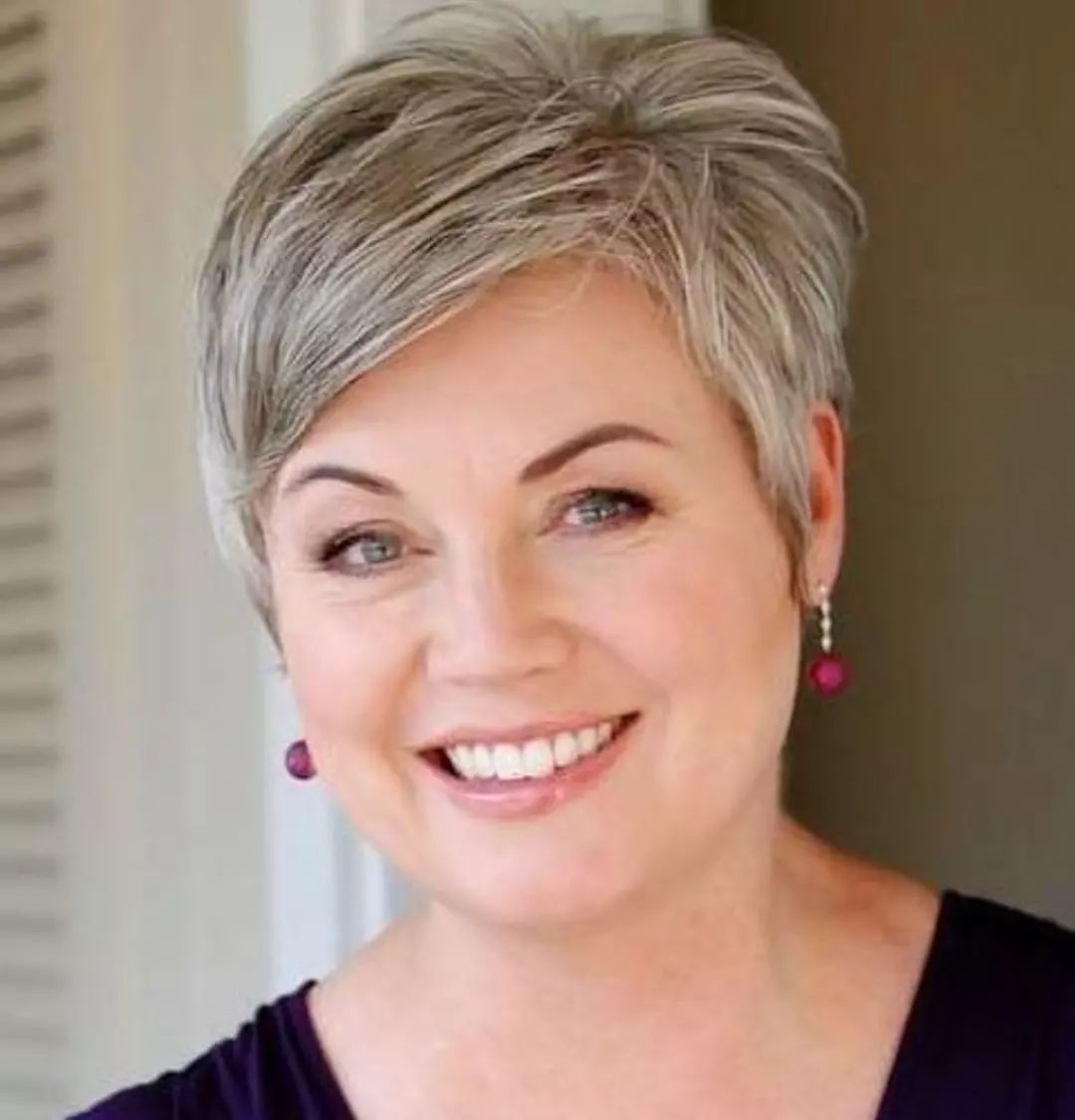 Silver Grey Pixie With Side-Swept Bangs Silver Grey Pixie With Side-Swept Bangs — Winter Hairstyles for Thin Hair