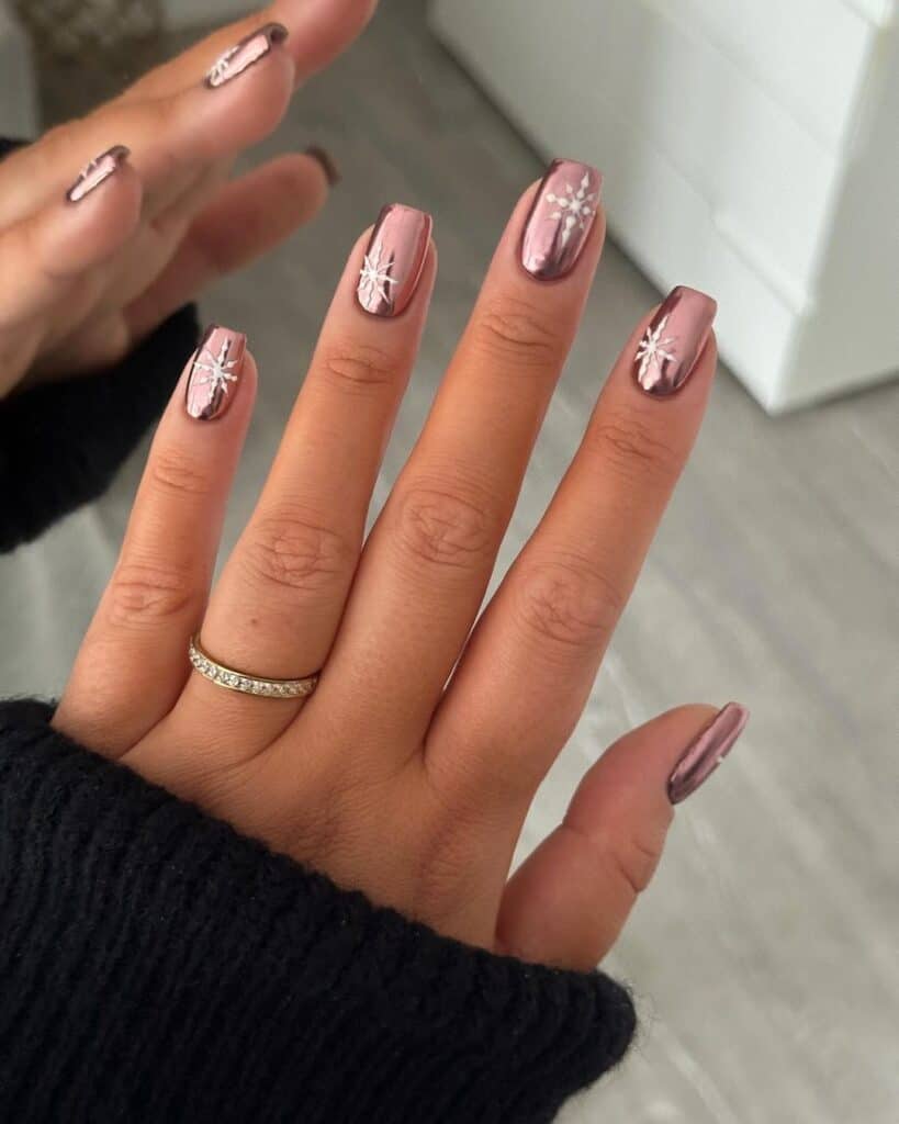 Rose Gold Chrome Snowflake Short Coffin Rose Gold Chrome Snowflake Short Coffin — Winter Nail Colors for Women Over 50