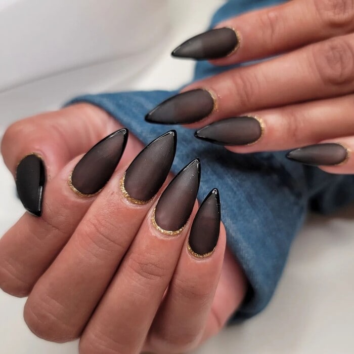 Sheer Black Matte Gold Cuticle Trim Stilettos Sheer Black Matte Gold Cuticle Trim Stilettos — Winter Stiletto Nails