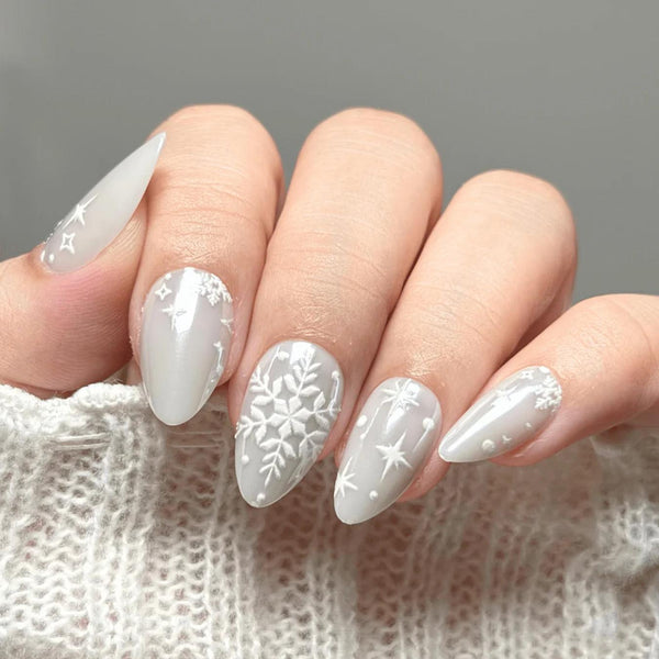 Embossed White Snowflake and Star Designs on Grey — Winter White Nails
