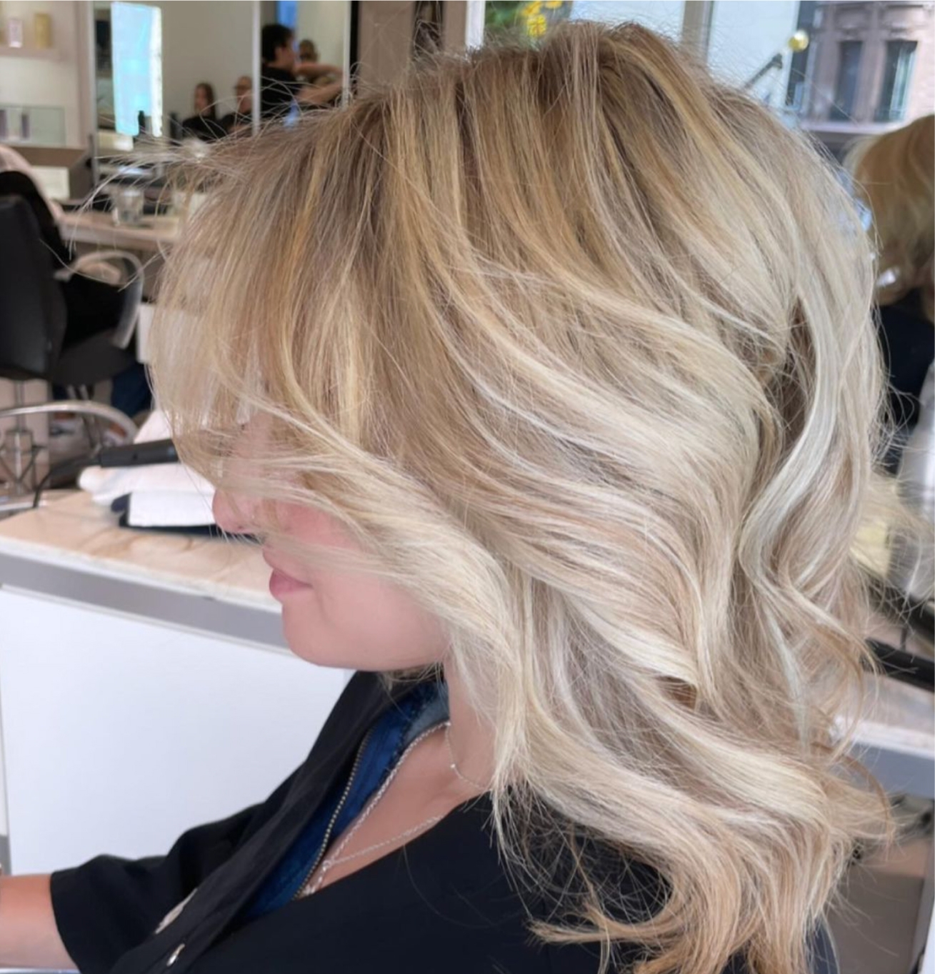 Icy Blonde Lob With Side Bangs — Winter Hair Colors for Blondes