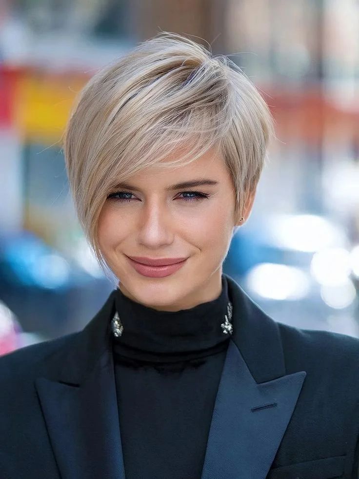 Asymmetrical Pixie With Side Bangs Asymmetrical Pixie With Side Bangs — Winter Haircuts for Thin Hair