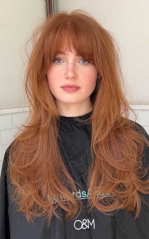 Golden Copper Mid-Back Layers With Full Bangs — Winter Haircuts with Bangs
