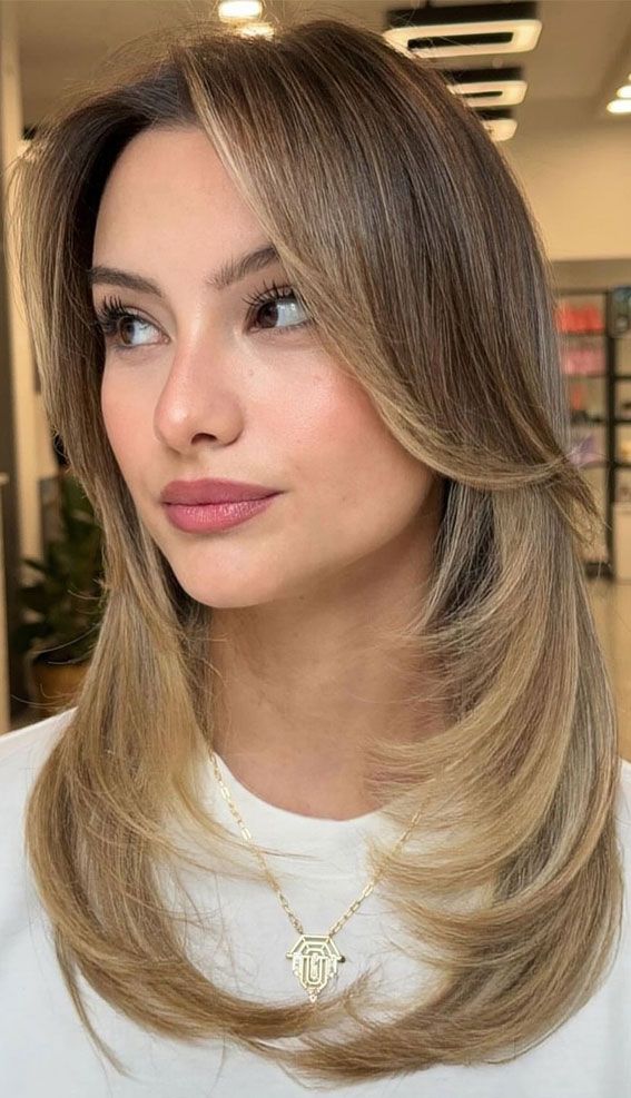 Mid-Back Velvety Plum With Loose Waves — Winter Haircuts with Curtain Bangs