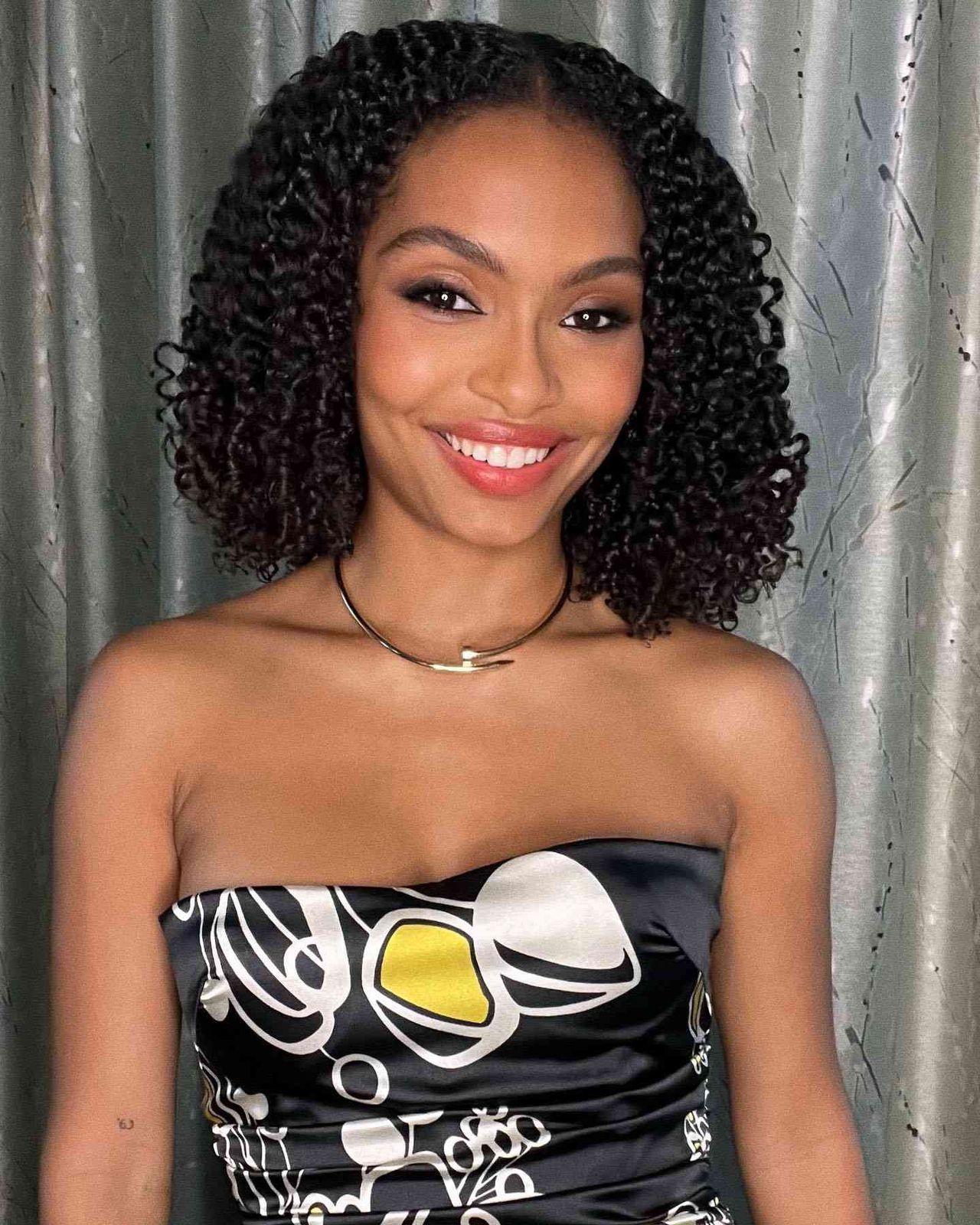 Polished Black Curly Bob — Winter Haircuts for Curly Hair