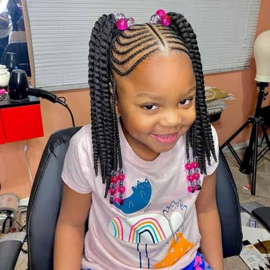 Braids Reach Mid-Back Two Braided Pigtails with Pink Beads Braids Reach Mid-Back Two Braided Pigtails with Pink Beads — Winter Hairstyles for Black Kids