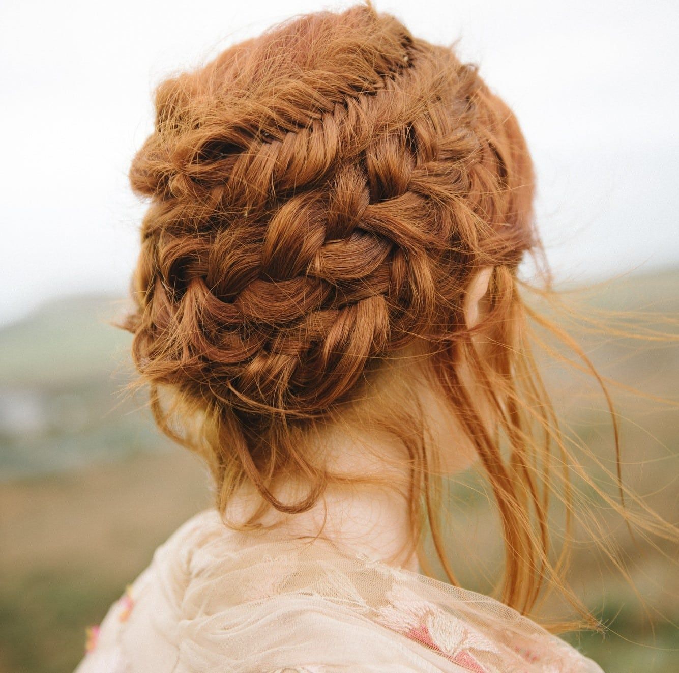 Mid-Back Intricate Braided Bun in Red — Winter Bun Hairstyles