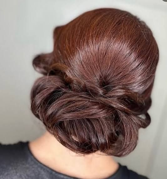 Dark Brown Polished Low Chignon — Winter Date Night Hairstyles