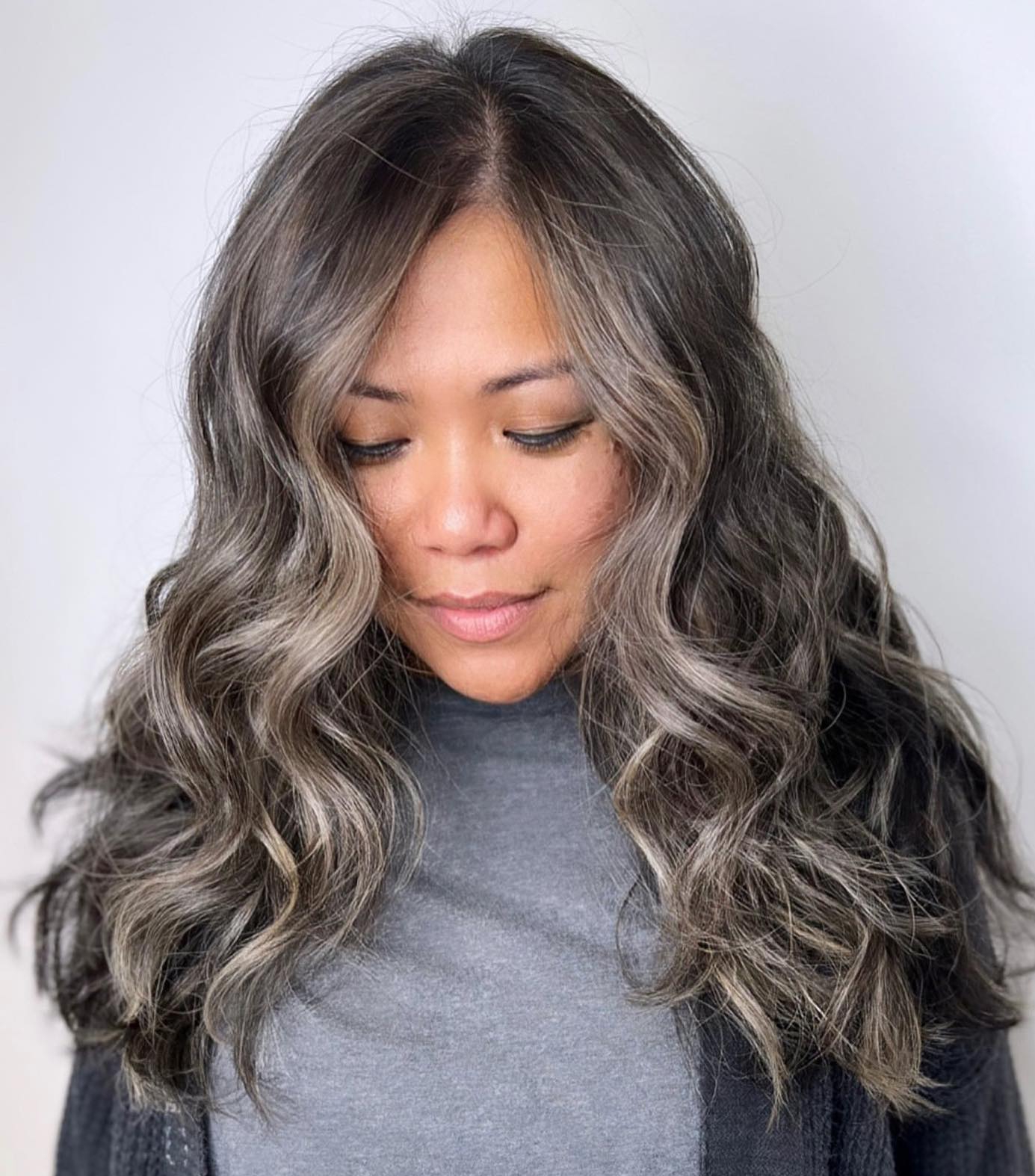 Mid-Back Waves With Curtain Bangs — Gray Blending Highlights