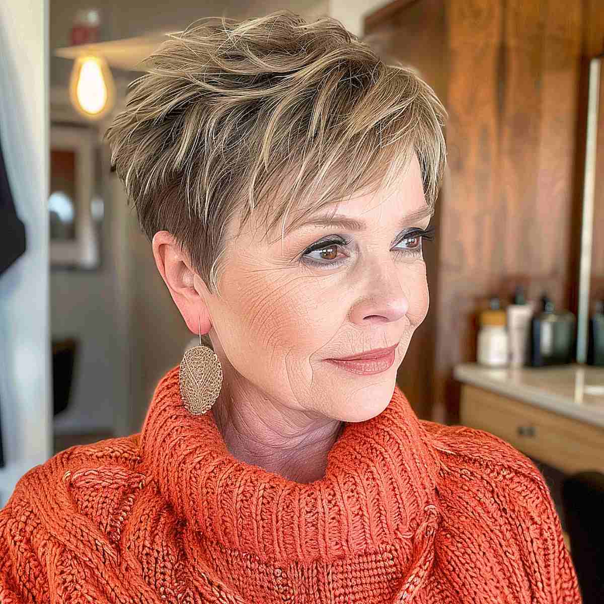 Ash Blonde Pixie Shag with Choppy Bangs — Winter Haircuts for Women Over 60