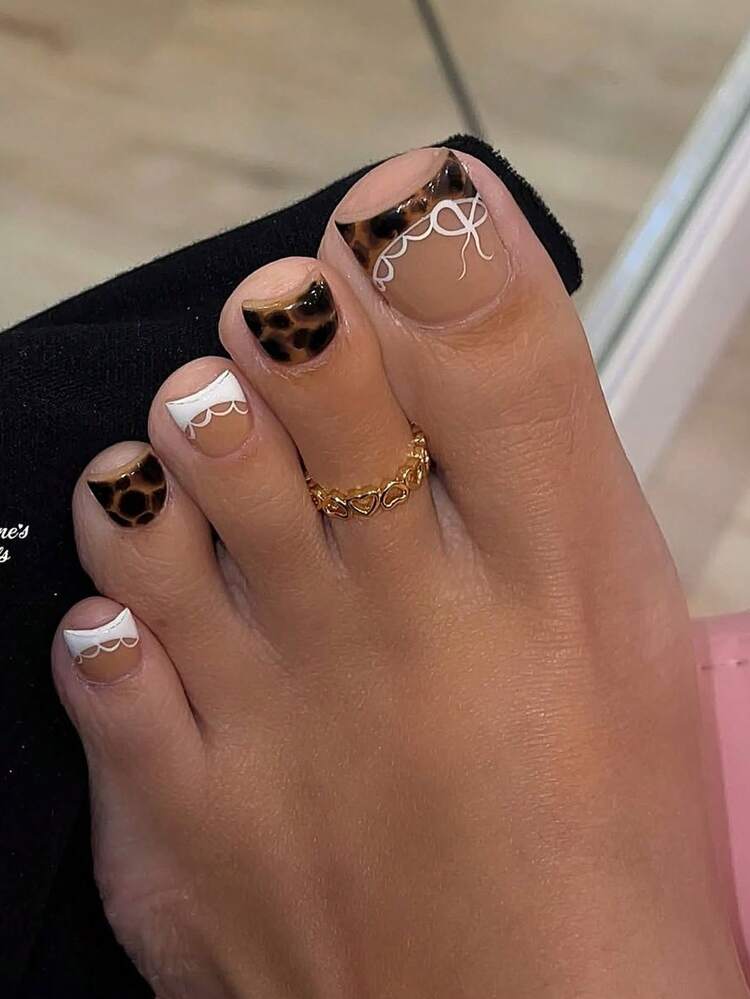 Nude French Tips with Playful Art Nude French Tips with Playful Art — Winter Toe Nails