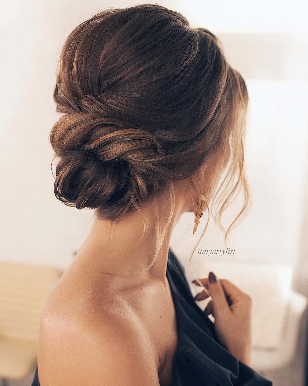Ash Blonde Low Bun With Smooth Finish Ash Blonde Low Bun With Smooth Finish — Winter Wedding Hairstyles