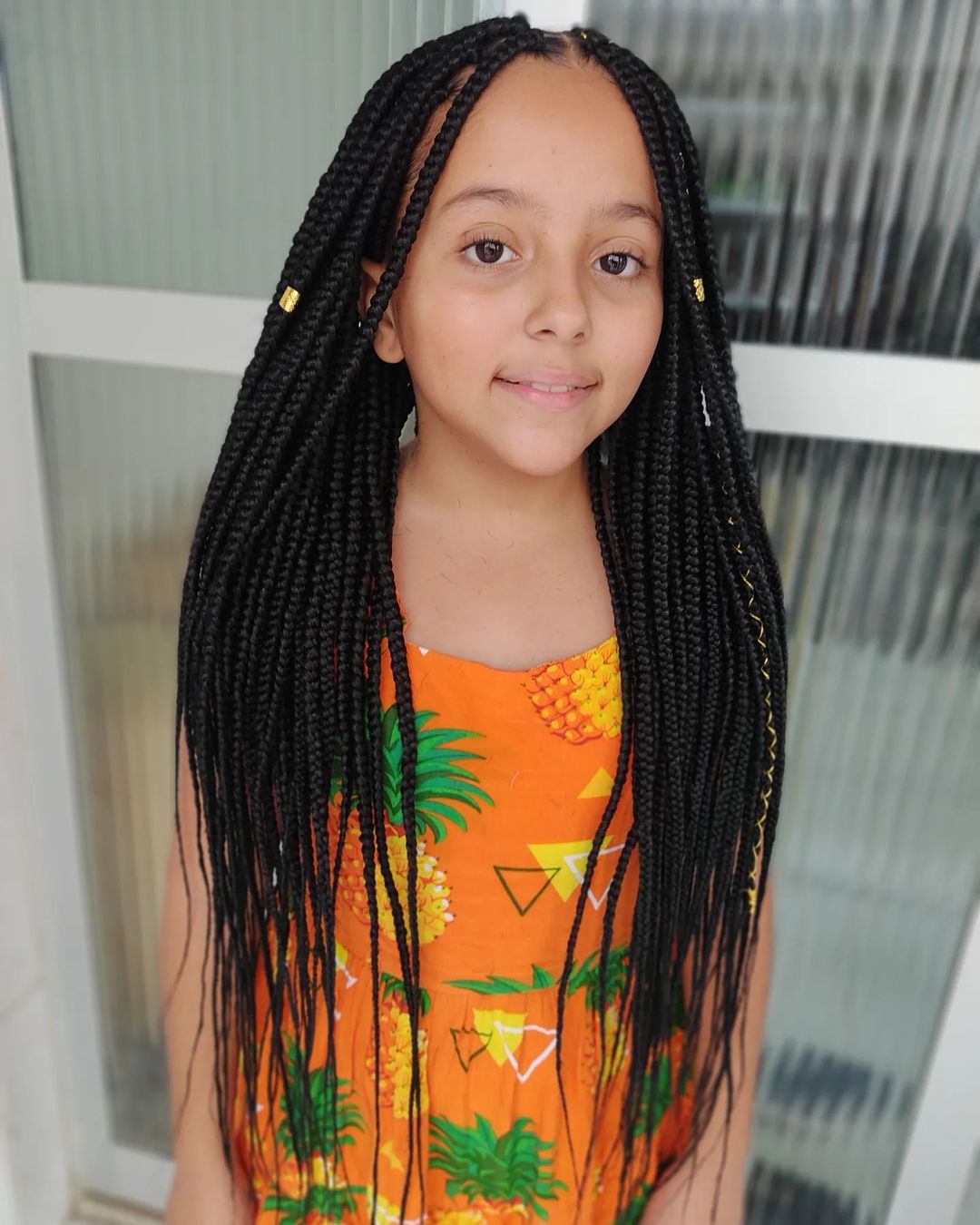 Long Neat Box Braids with Gold Accents Long Neat Box Braids with Gold Accents — Winter Hairstyles for Black Kids