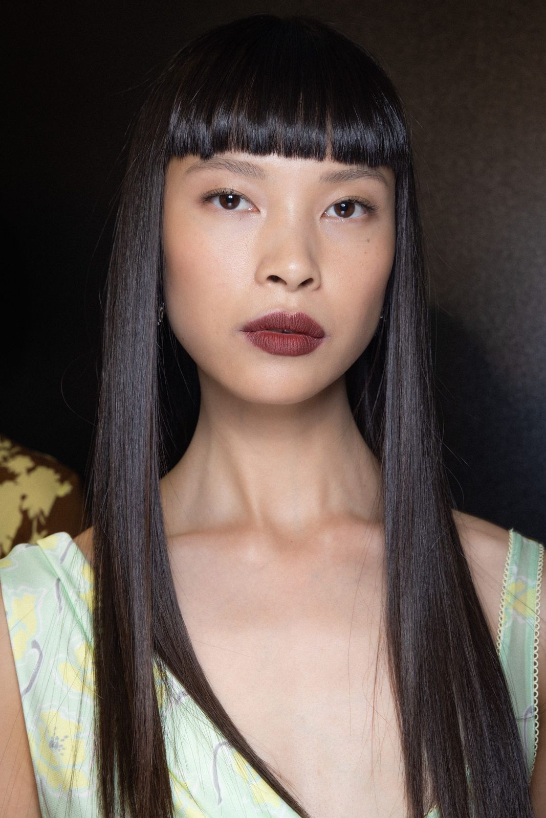 Mid-Back Dark Brown with Blunt Bangs — Winter Haircuts for Straight Hair