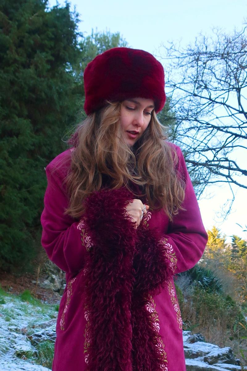 Bold Contrast: Burgundy Fur Hat with Pink Embroidered Coat — Fur Hat Outfits