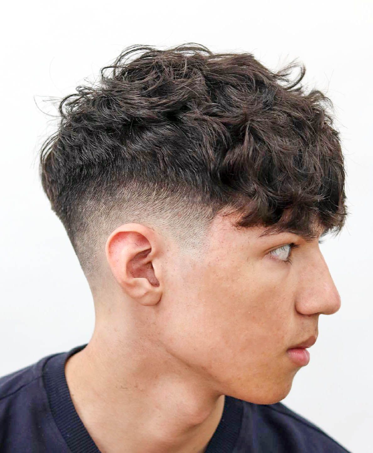 Textured Crop With Tousled Bangs and Fade Textured Crop With Tousled Bangs and Fade — Winter Haircuts for Boys