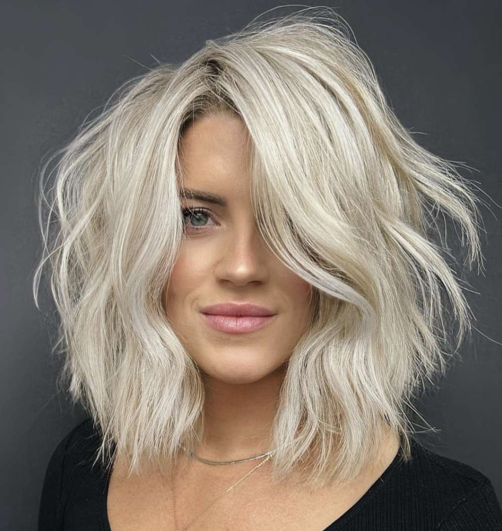 Chin Choppy Ash Bob With Side Bangs — Winter Layered Haircuts
