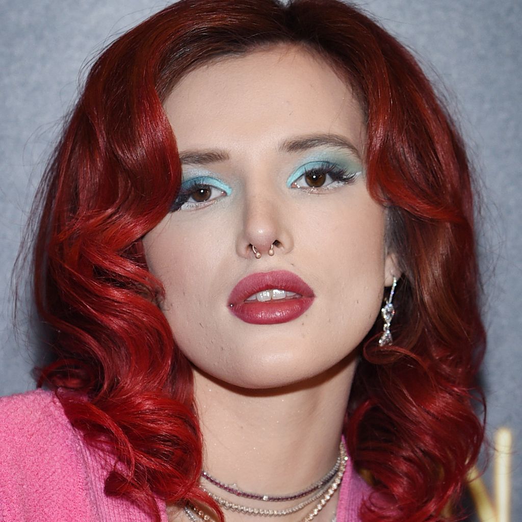 Vibrant Red Layered Waves — Winter Hair Colors for Women Over 40