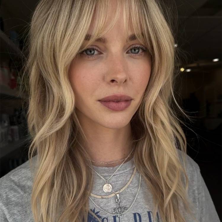 Ash Blonde Shag With Wispy Bangs — Winter Layered Haircuts