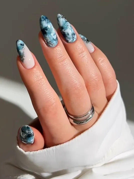 Blue and White Stiletto Marble with Glitter — Winter Marble Nails