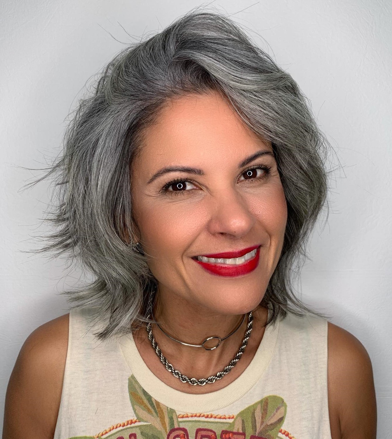 Collarbone-Length Textured Shag With Blunt Bangs Collarbone-Length Textured Shag With Blunt Bangs — Winter Haircuts for Gray Hair