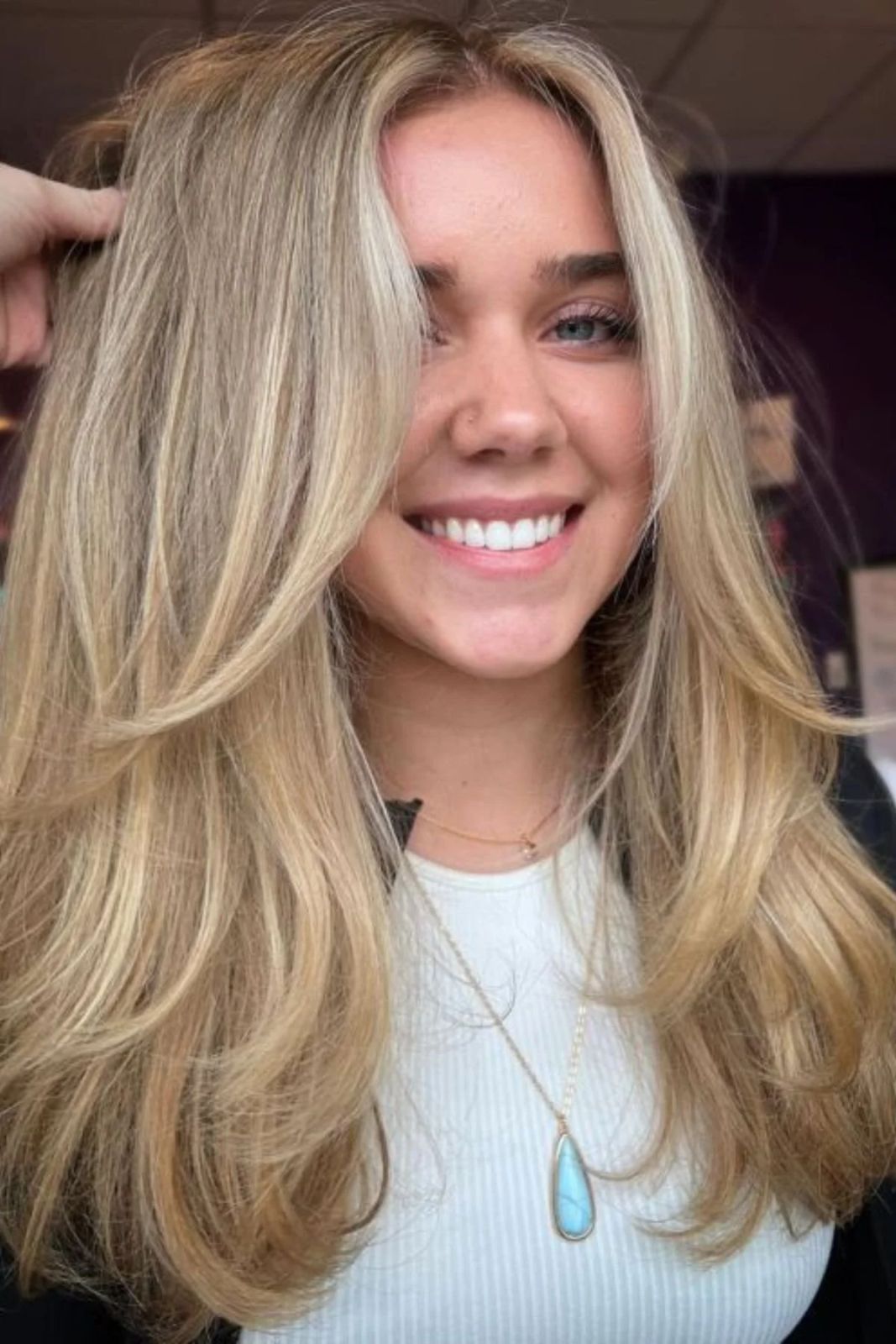 Mid-Back Straight Blowout — Winter Haircuts for Long Faces