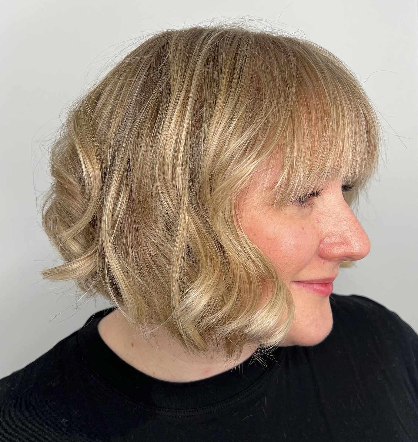 Angled Bob With Blunt Bangs — Winter Hair Colors for Plus Size Women