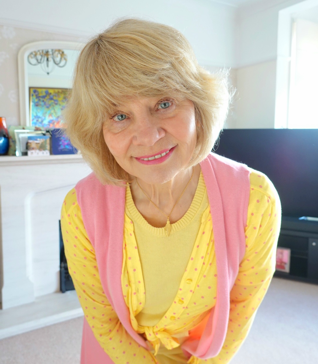 Golden Blonde Pixie with Wispy Bangs — Winter Hair Colors for Women Over 60