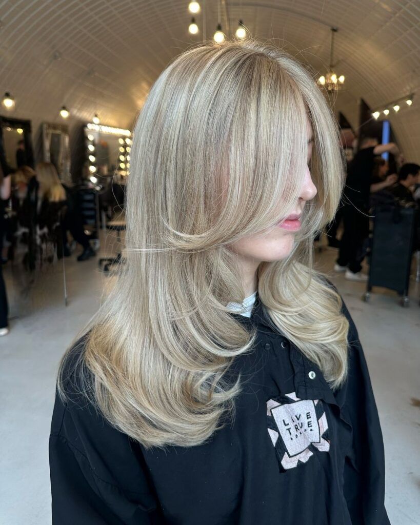Ash Blonde With Voluminous Curtain Bangs — Winter Haircuts with Curtain Bangs