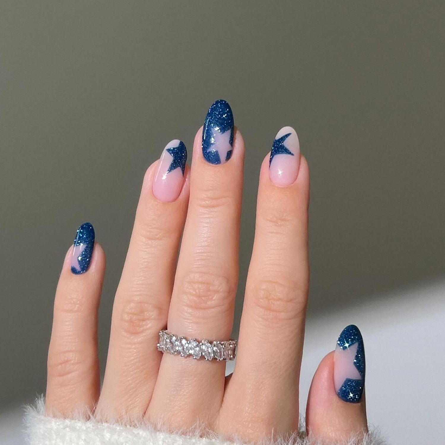 Blue Glitter Star Cutout Almond Nails Blue Glitter Star Cutout Almond Nails — Winter Nails