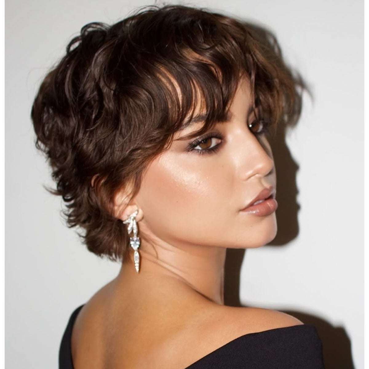 Ear Textured Pixie With Curly Fringe Ear Textured Pixie With Curly Fringe — Winter Hairstyles for Short Hair