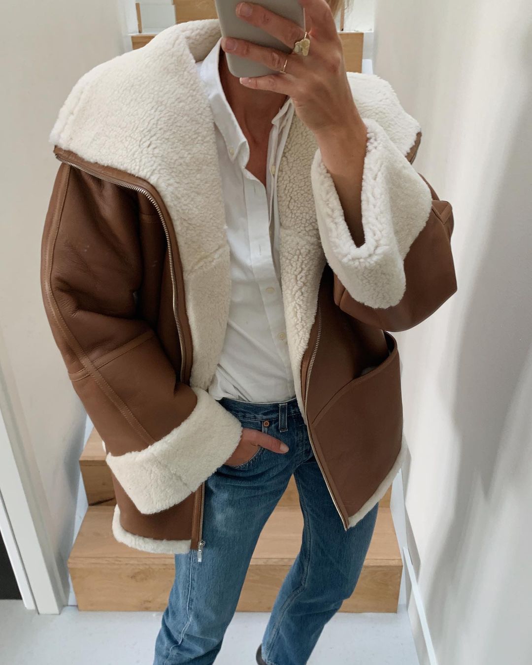 Shearling-Lined Jacket Over Button-Down and Jeans for Cozy Warmth Shearling-Lined Jacket Over Button-Down and Jeans for Cozy Warmth — Cabin Trip Outfits