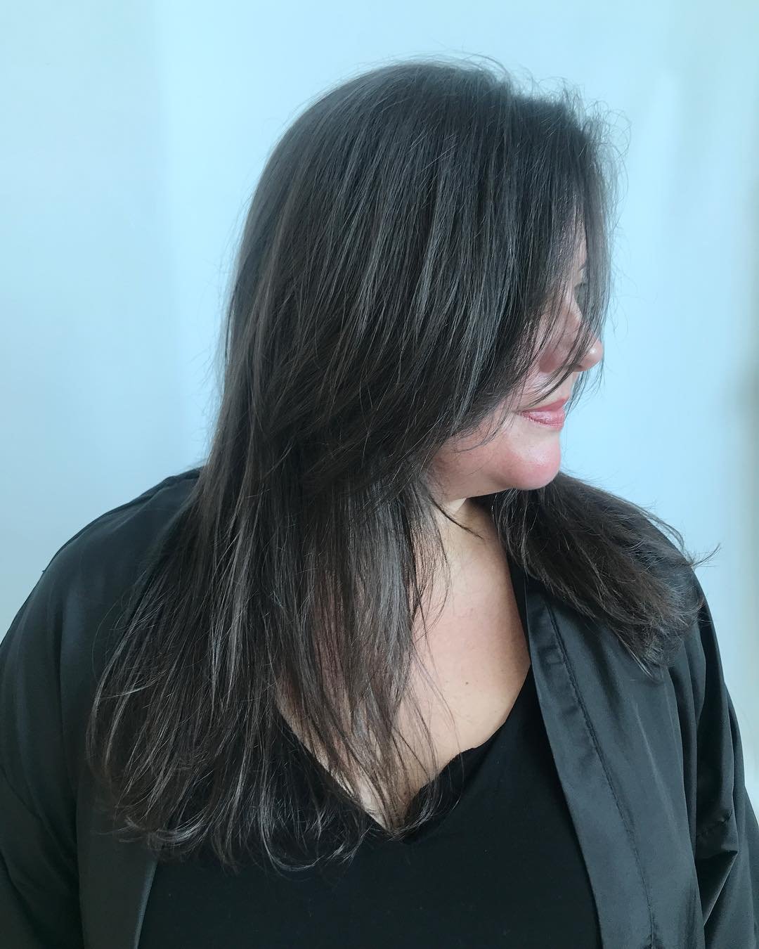 Chin-Length Layered Bob With Side-Swept Bangs Chin-Length Layered Bob With Side-Swept Bangs — Winter Hairstyles for Plus Size Women