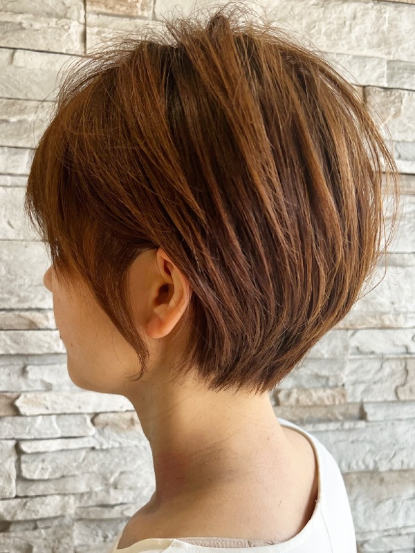 Ash Blonde Layered Bob With Wispy Bangs — Winter Hair Colors for Women Over 40
