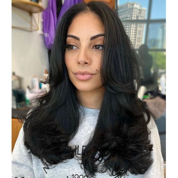 Voluminous Dark Brown Blowout — Winter Haircuts for Long Faces