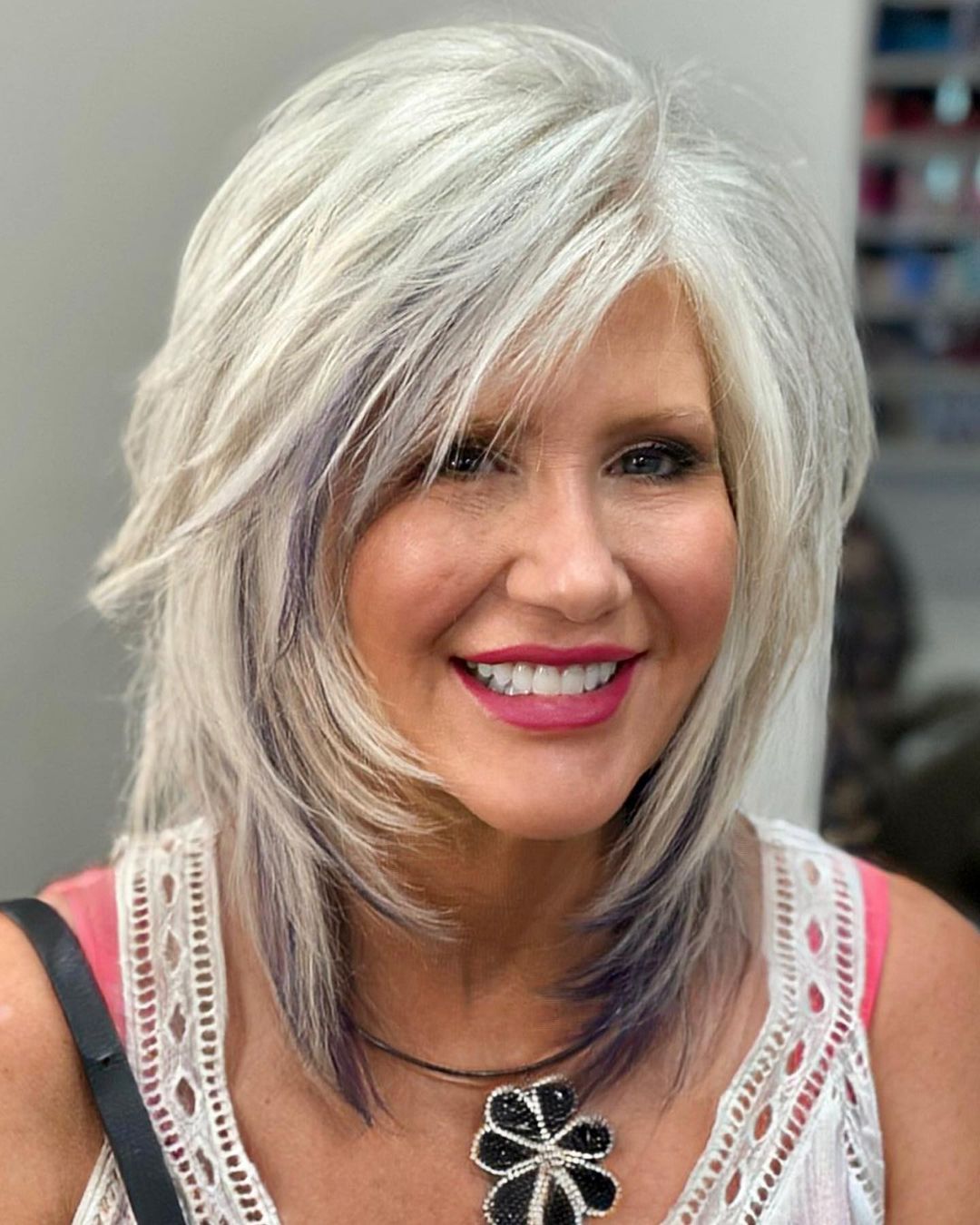 Shoulder-Length Silver Shag with Purple Streaks — Winter Haircuts for Women Over 50