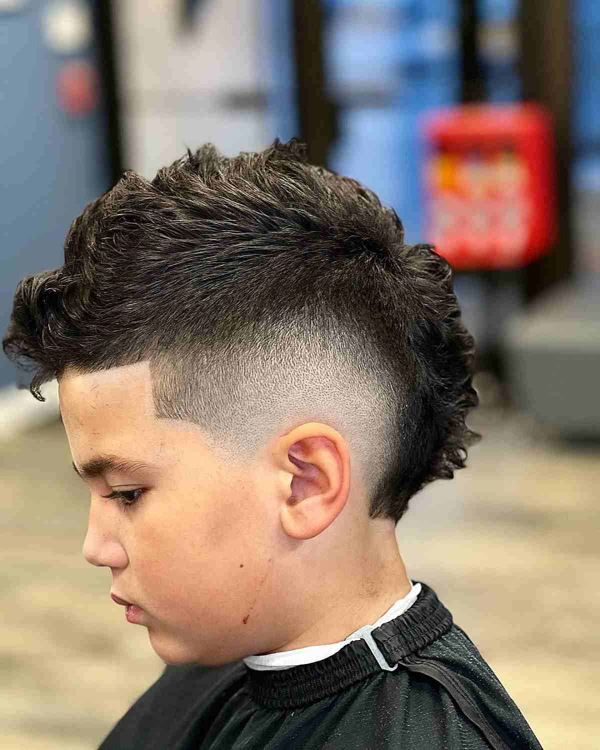 Textured Mohawk With Sharp Fade Textured Mohawk With Sharp Fade — Winter Haircuts for Boys