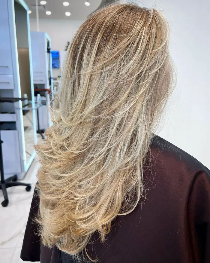 Voluminous Blonde Layered Cut — Winter Haircuts for Women Over 50