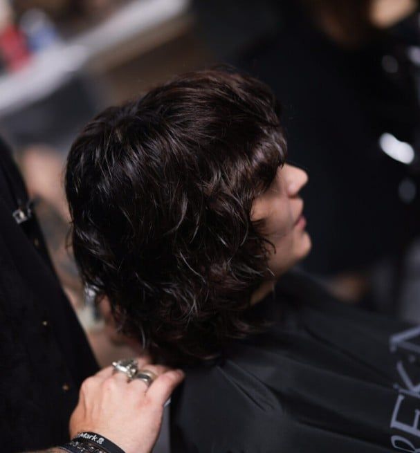 Chin Shag With Side-Swept Choppy Bangs — Winter Haircuts with Bangs