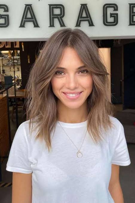 Layered Bob With Ash Brown Highlights — Winter Haircuts with Curtain Bangs