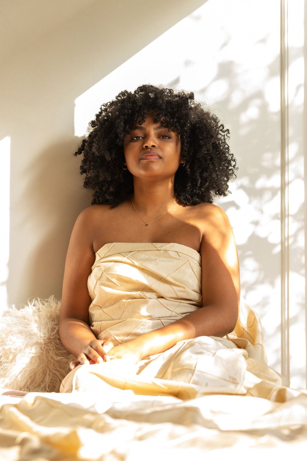 Voluminous Dark Brown Curls — Winter Haircuts for Curly Hair