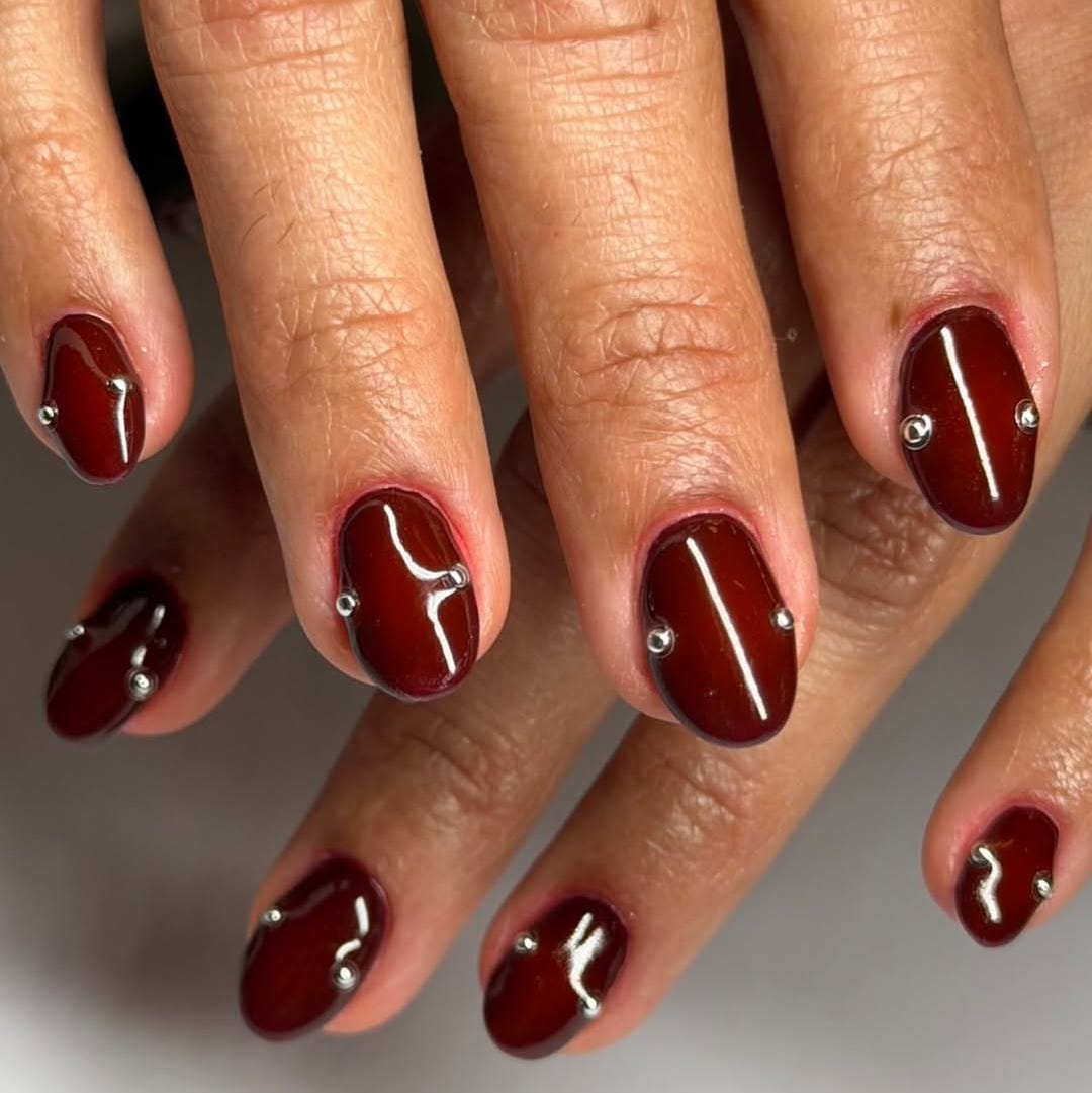 Edgy Deep Burgundy Oval Nails with Silver Studs — Burgundy Nails