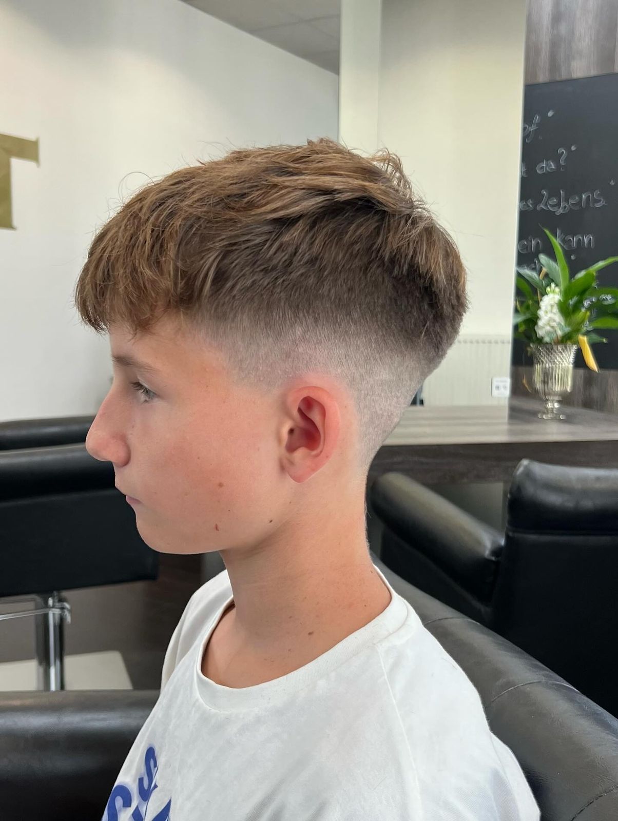 Medium Brown Textured Crop With Clean Fade and Wavy Top Medium Brown Textured Crop With Clean Fade and Wavy Top — Winter Haircuts for Boys