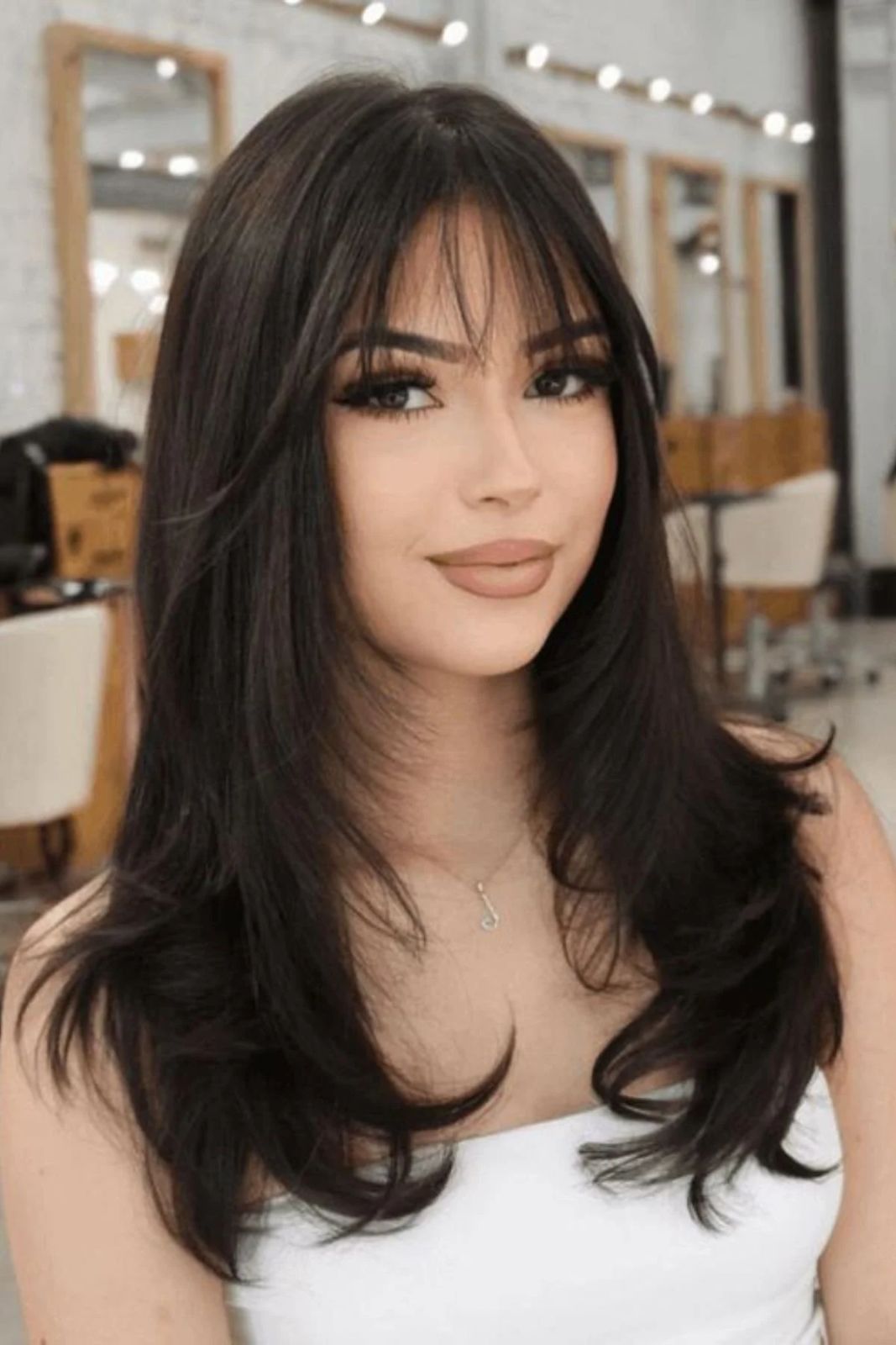 Thick Dark Brown Layers With Blunt Bangs — Winter Haircuts with Bangs