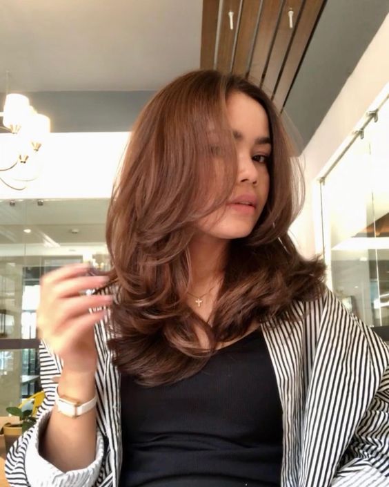 Layered Collarbone With Volume Blowout — Winter Haircuts with Curtain Bangs