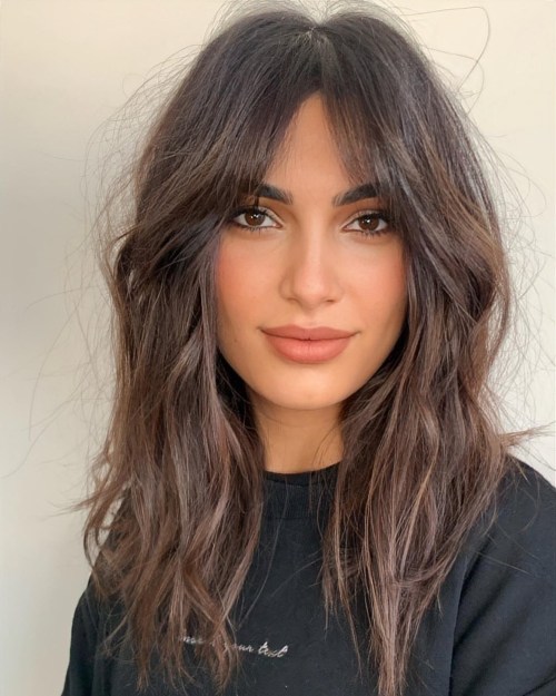 Long Layered Hair with Reddish Undertones Long Layered Hair with Reddish Undertones — Winter Haircuts for Oval Faces