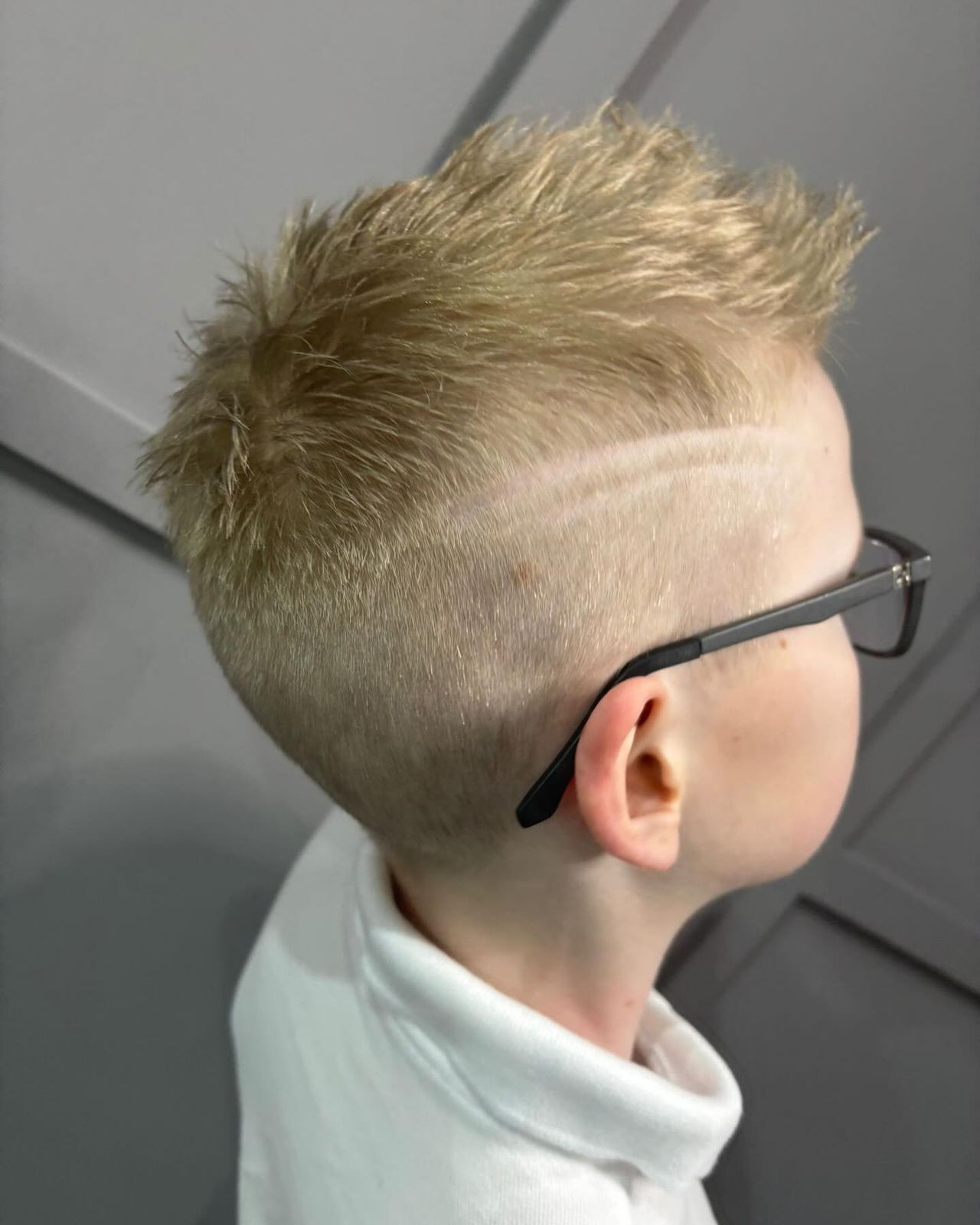 Textured Quiff With Undercut and Dark Roots Textured Quiff With Undercut and Dark Roots — Winter Haircuts for Boys