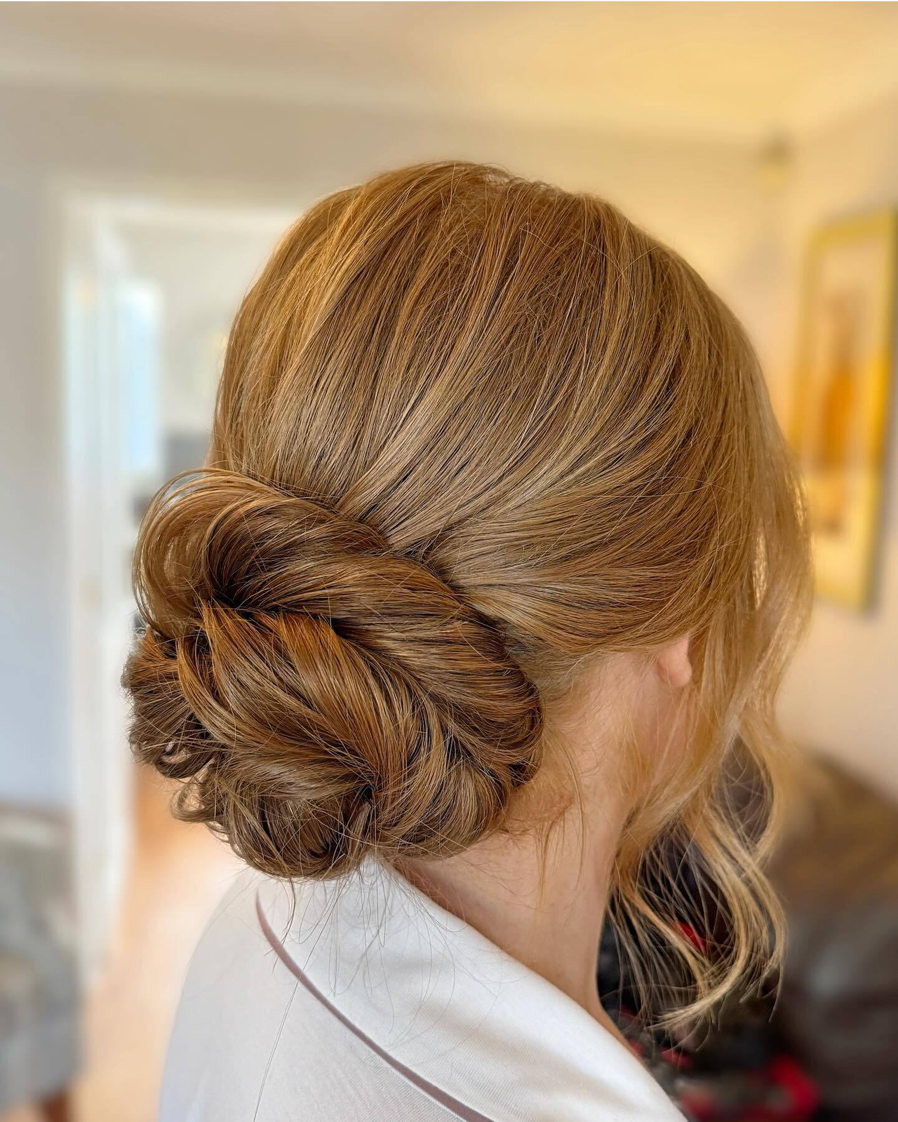 Smooth Twisted Blonde Bun — Winter Bun Hairstyles