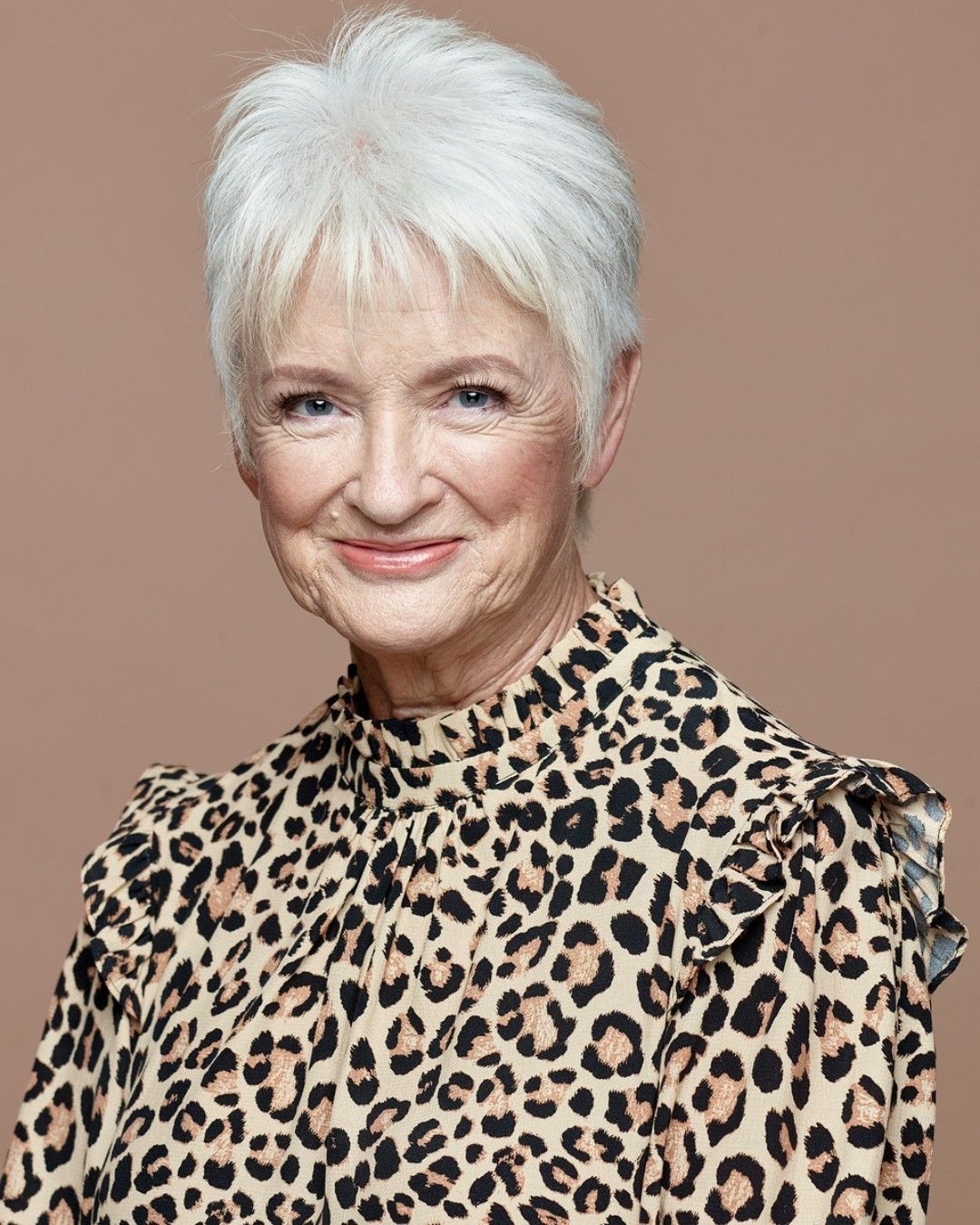 Voluminous Silver White Bob Voluminous Silver White Bob — Winter Hairstyles for Women Over 70