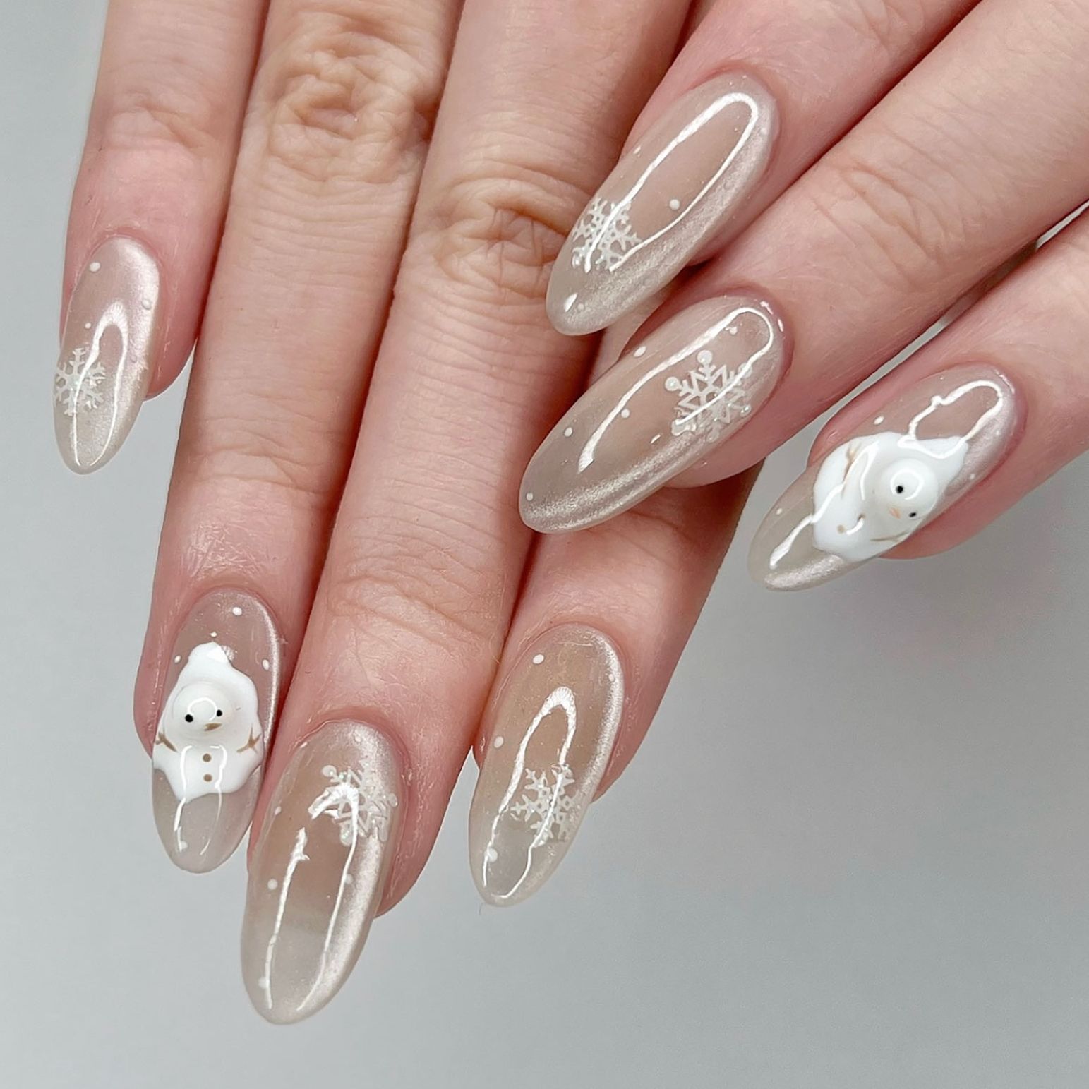 Sheer Nude Oval Nails with Snowflakes Sheer Nude Oval Nails with Snowflakes — Winter Gel Nails